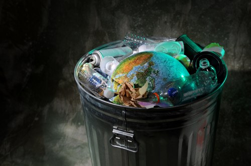 Workers removing builders' waste from a construction site